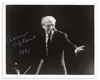 COPLAND, AARON. Two items: Concert poster Signed * Photograph dated and Signed, in white pencil.